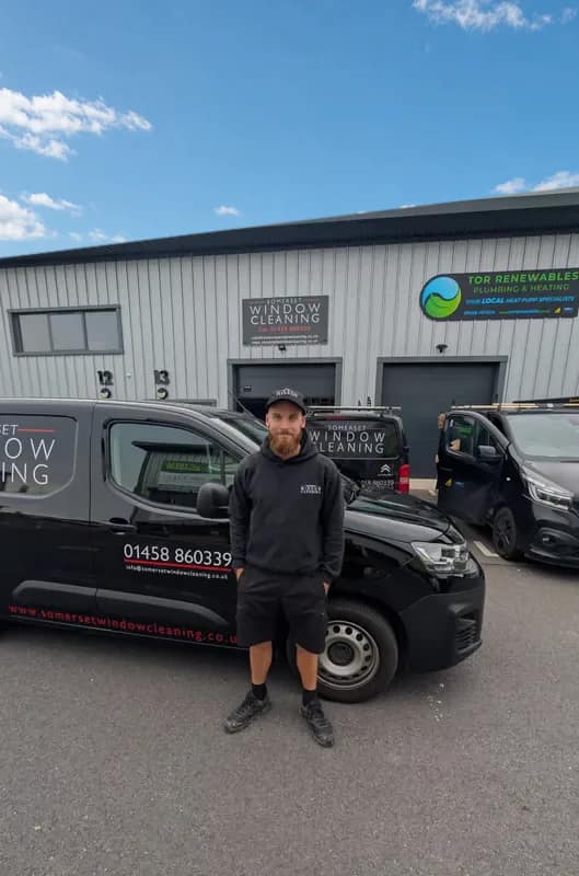 Sean, operations manager, beside a Somerset Window Cleaning van