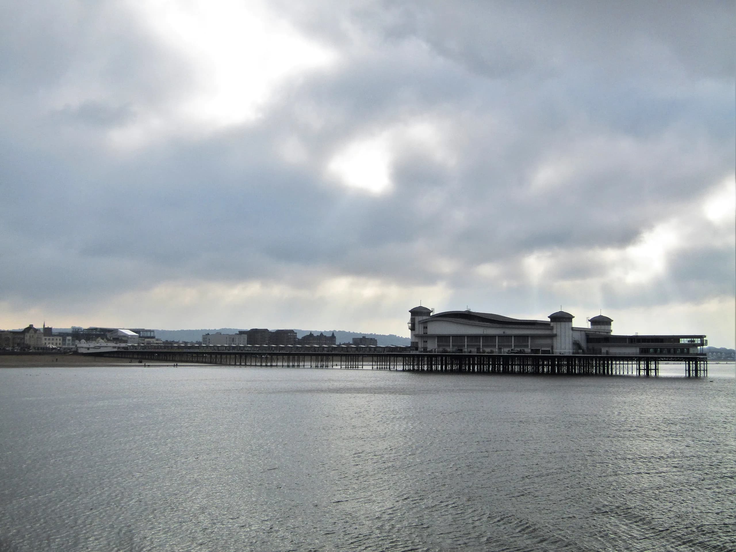 The Grand Pier at Weston-super-Mare under a cloudy sky