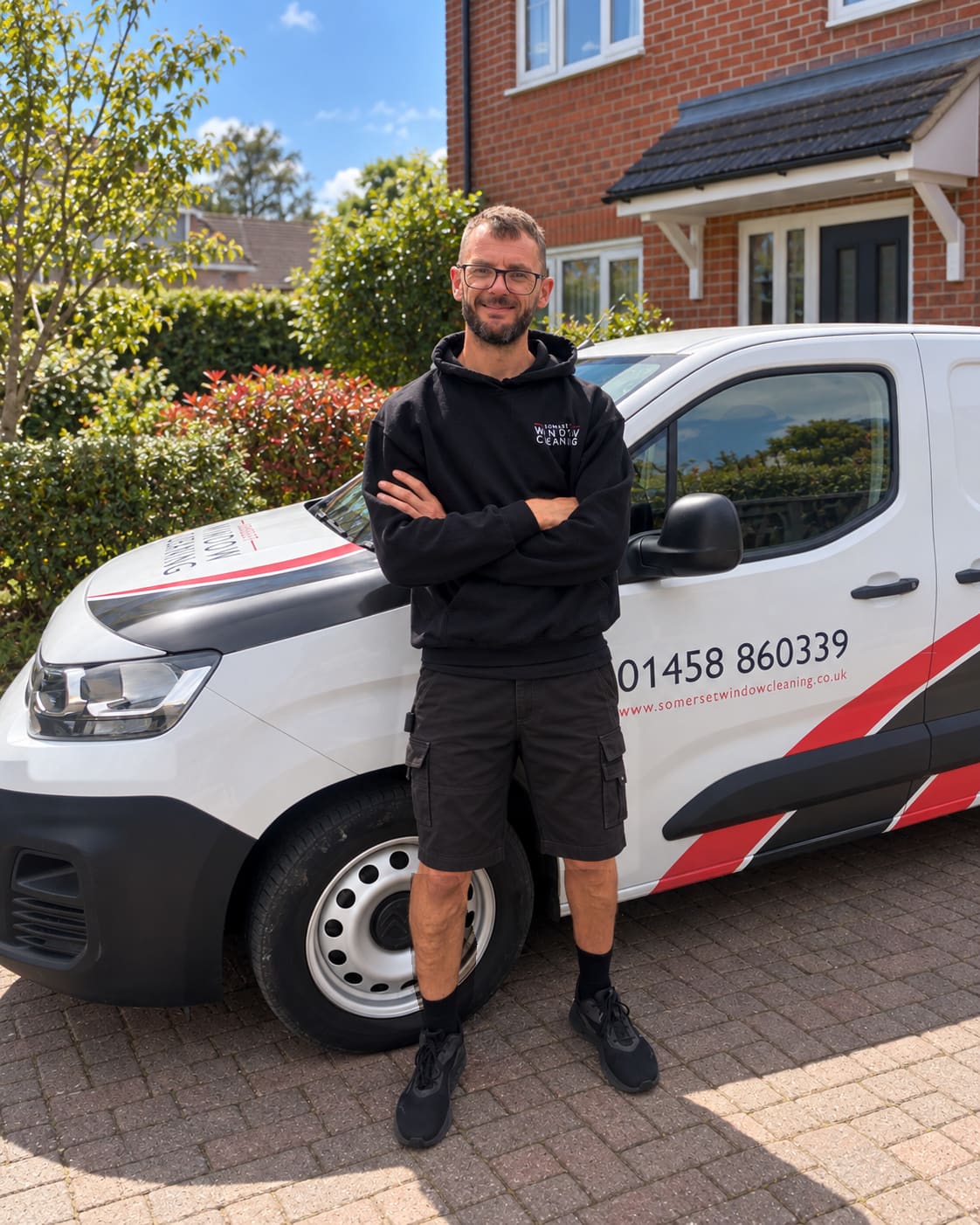 Steve, Window Cleaner at Somerset Window Cleaning; portrait with an edited van background