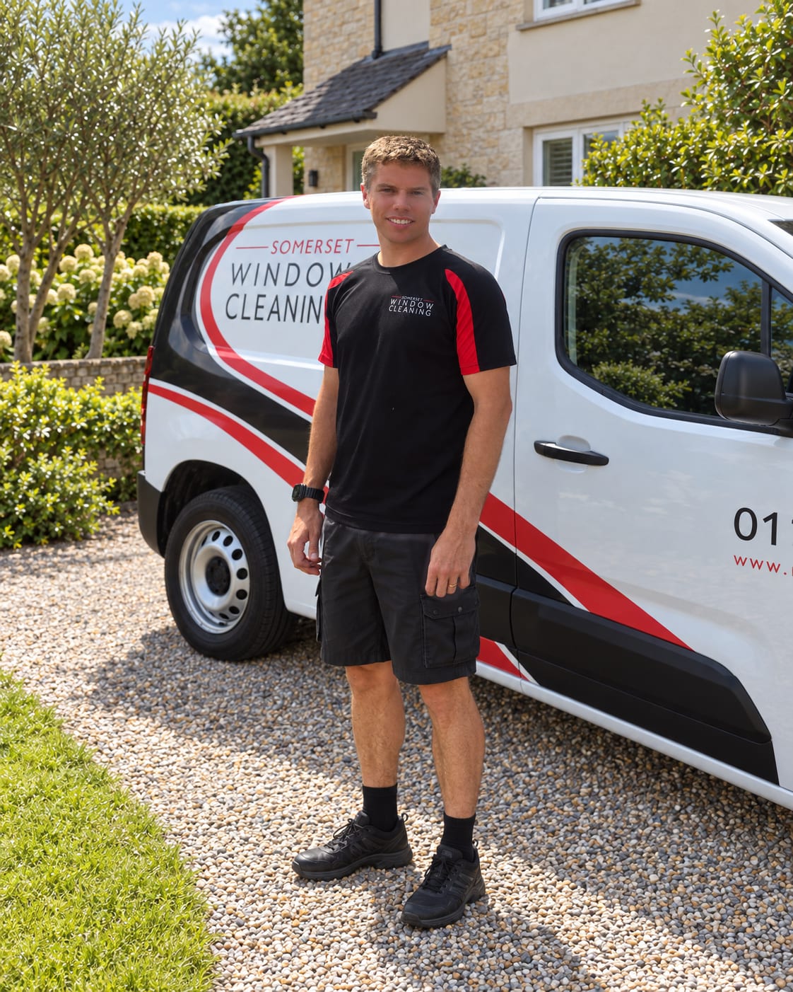 Dan Lee, owner and founder of Somerset Window Cleaning; portrait with an edited van background