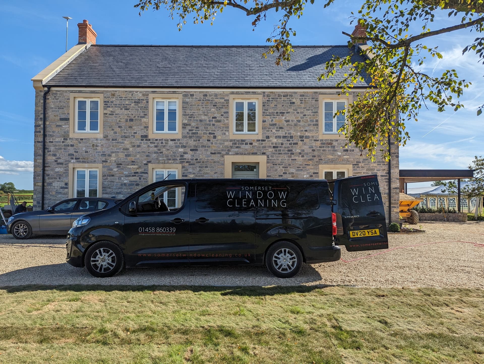 Somerset Window Cleaning van at work site