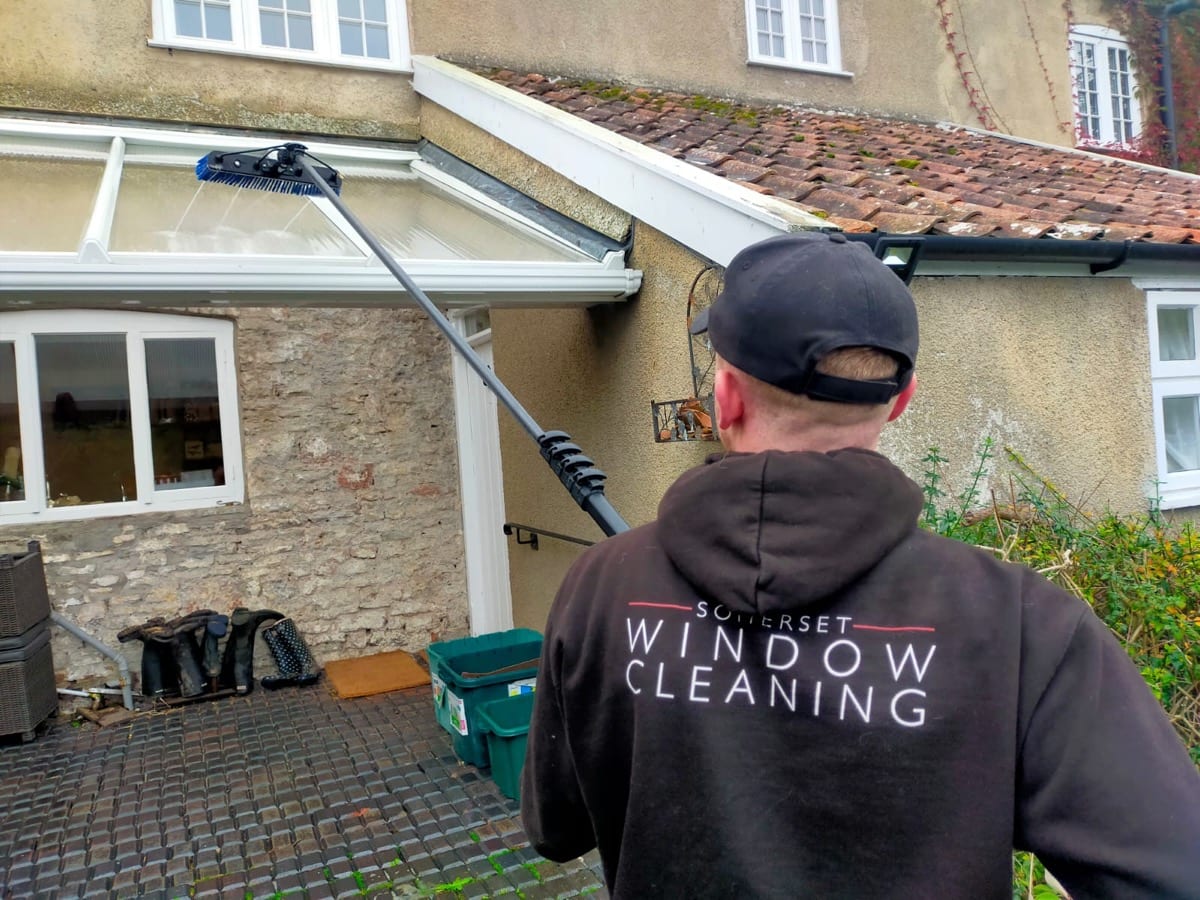 Before and after of a conservatory roof clean showing restored clarity