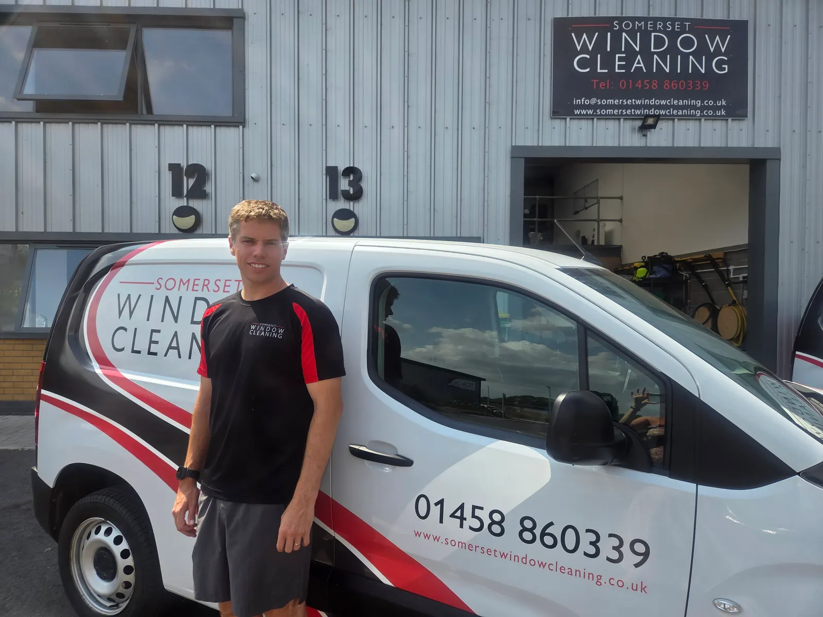 Dan, the owner, beside a newly wrapped Somerset Window Cleaning van outside our unit in Street